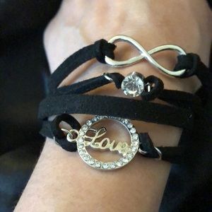 Black three strand “Love” infinity bracelet.